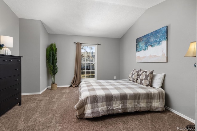 carpeted bedroom featuring vaulted ceiling