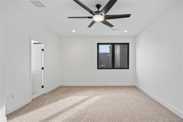 carpeted empty room with recessed lighting, visible vents, ceiling fan, and baseboards