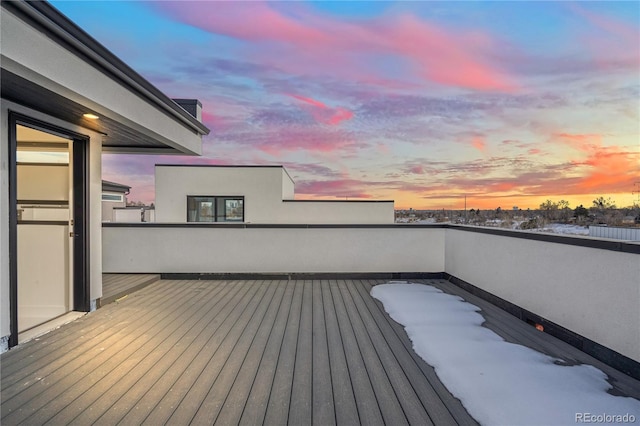 view of snow covered deck