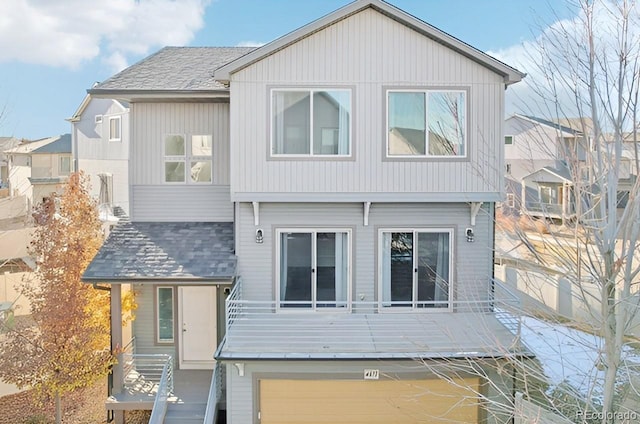 view of front of property with a garage