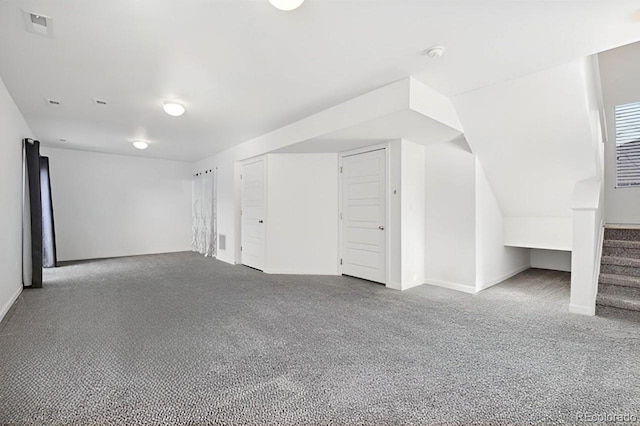 bonus room with carpet