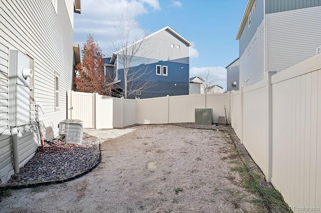 view of yard featuring central air condition unit