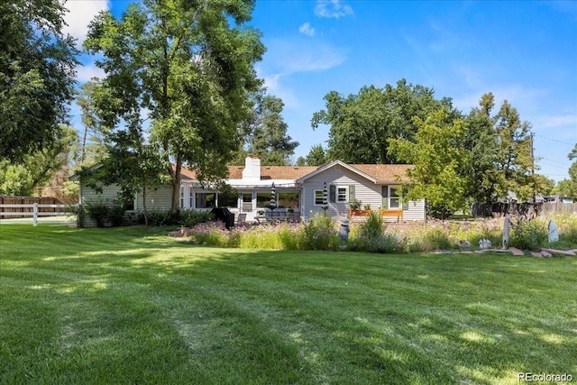 7750 W 5th Ave, Lakewood, CO 80226 - rear view of house with a chimney