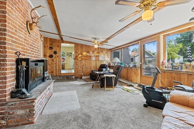7750 W 5th Ave, Lakewood, CO 80226 - carpeted living room with a ceiling fan, wood walls, and beamed ceiling