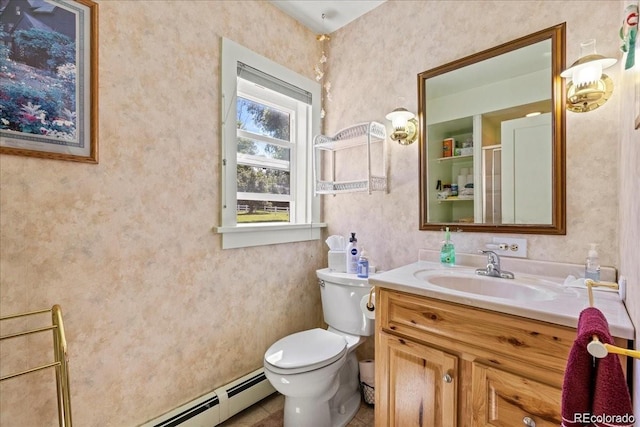 7750 W 5th Ave, Lakewood, CO 80226 - bathroom with toilet, vanity, wallpapered walls, and baseboard heating