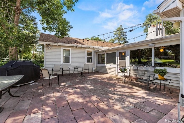 7750 W 5th Ave, Lakewood, CO 80226 - back of house with a patio area