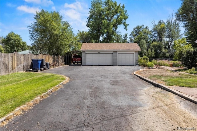 7750 W 5th Ave, Lakewood, CO 80226 - garage with asphalt driveway