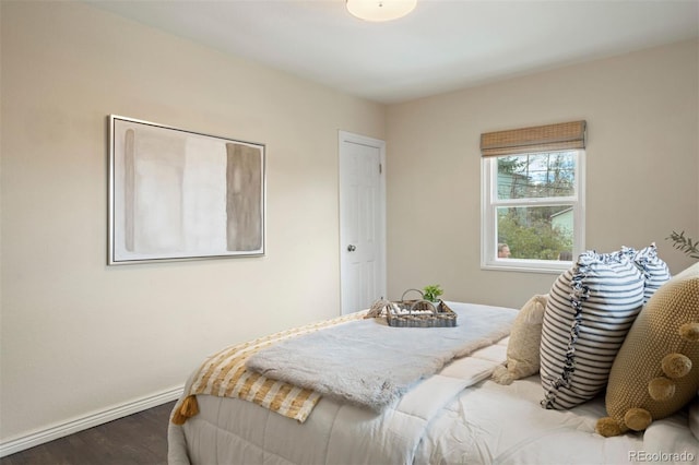 bedroom featuring dark hardwood / wood-style floors