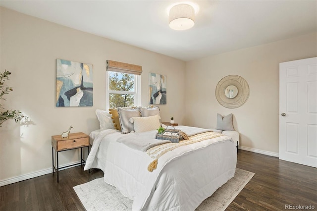 bedroom featuring dark hardwood / wood-style floors