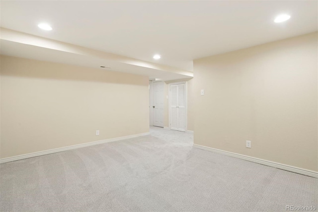 basement with light carpet