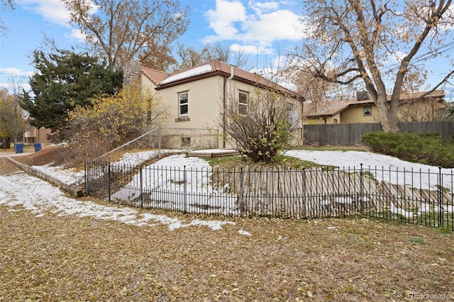 view of snow covered property