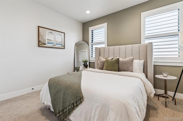 carpeted bedroom with baseboards and recessed lighting