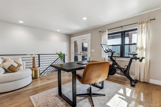 office space with baseboards, french doors, wood finished floors, and recessed lighting