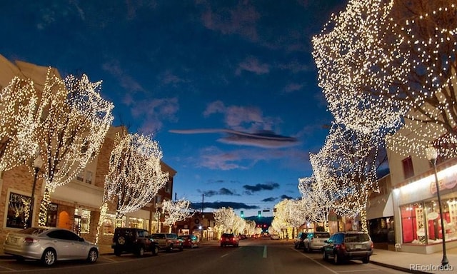 5423 S Prince St Unit B, Littleton, CO 80120 - view of asphalt road with street lighting, sidewalks, and curbs