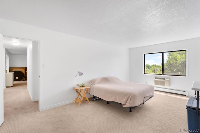14300 E Marina Dr Unit 306, Aurora, CO 80014 - carpeted bedroom with a baseboard radiator and a wall mounted air conditioner