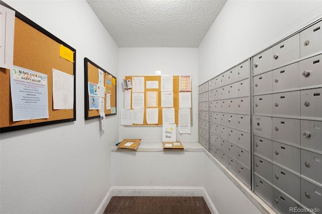 14300 E Marina Dr Unit 306, Aurora, CO 80014 - surrounding community featuring a textured ceiling and mail area