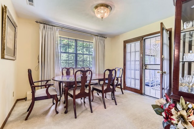 3724 S Poplar St, Denver, CO 80237 - dining area with light carpet and baseboards