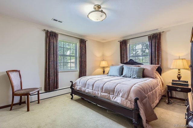 3724 S Poplar St, Denver, CO 80237 - bedroom featuring light carpet, multiple windows, and a baseboard heating unit