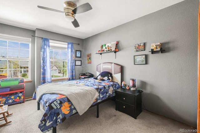 bedroom featuring carpet and ceiling fan