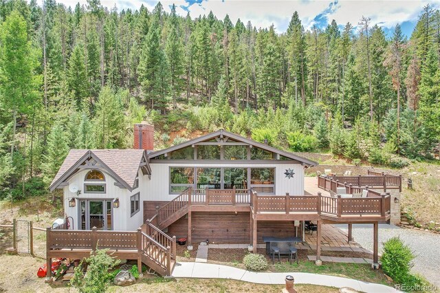 view of front of home with a deck