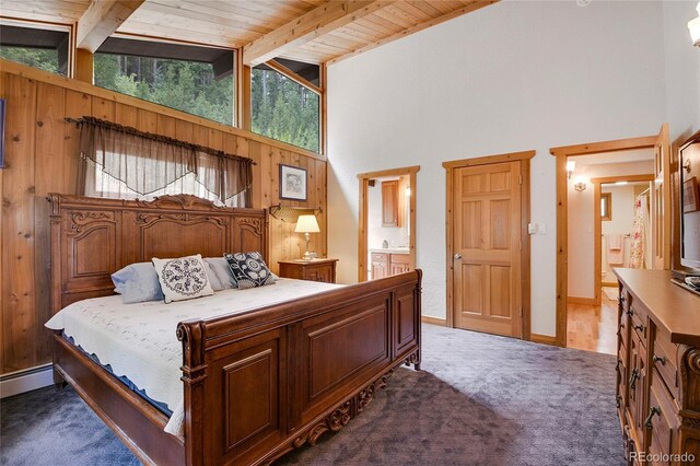 1774 Upper Bear Creek Rd, Evergreen, CO 80439 - bedroom featuring carpet floors, high vaulted ceiling, wood ceiling with exposed beams, wood walls, and connected bathroom