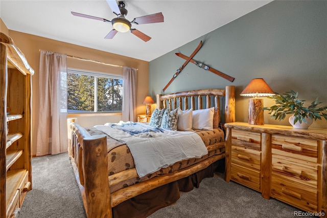 bedroom with a ceiling fan and carpet flooring