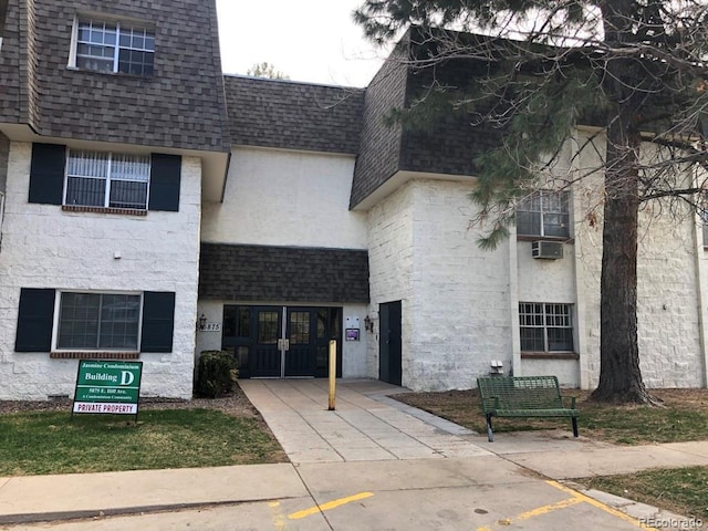 5875 E Iliff Ave Unit 203, Denver, CO 80222 - view of building exterior with cooling unit