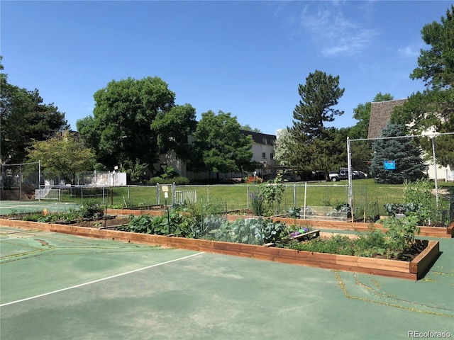 5875 E Iliff Ave Unit 203, Denver, CO 80222 - surrounding community with a vegetable garden