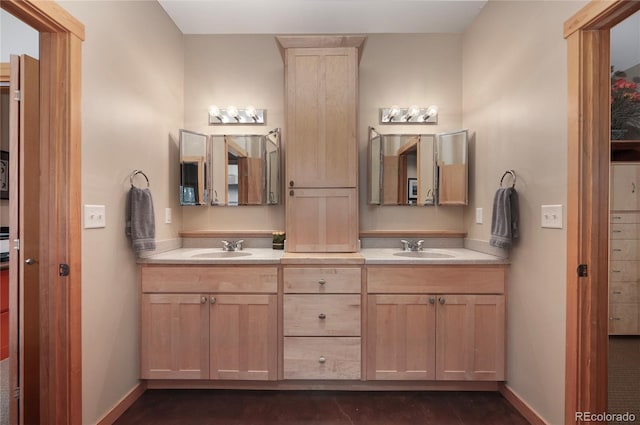 73244 US Highway 40, Tabernash, CO 80478 - bathroom with a sink, double vanity, and baseboards