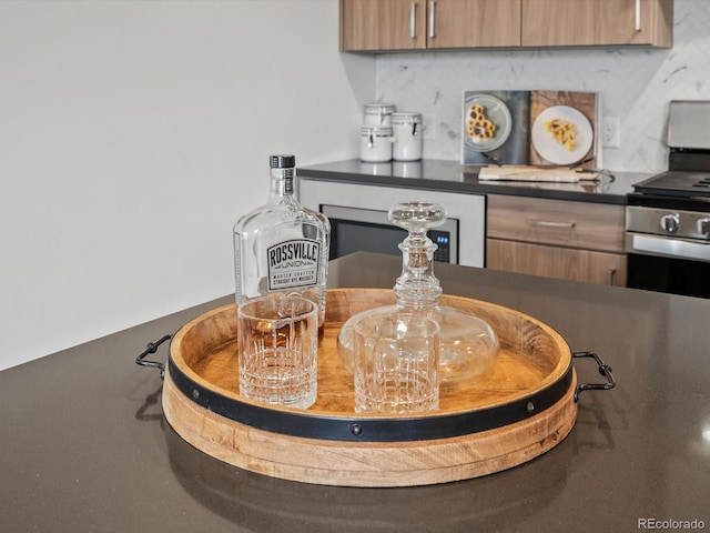 room details with dark countertops and electric stove