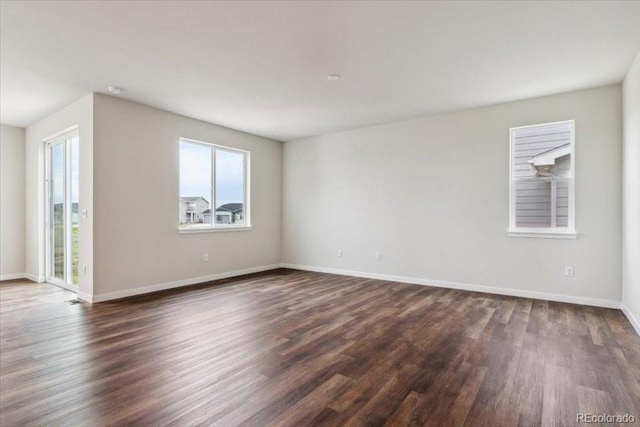 14406 Ranch St, Mead, CO 80504 - empty room with dark wood-style flooring and baseboards