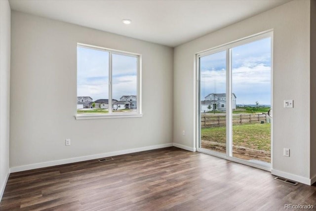 14406 Ranch St, Mead, CO 80504 - spare room featuring wood finished floors and recessed lighting