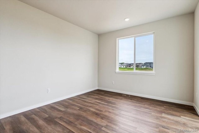 14406 Ranch St, Mead, CO 80504 - spare room featuring wood finished floors and recessed lighting