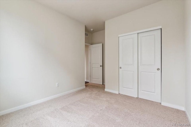 14406 Ranch St, Mead, CO 80504 - unfurnished bedroom with light colored carpet and a closet