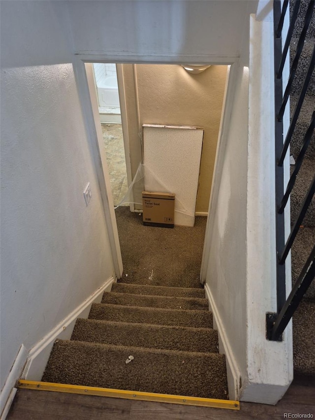 4678 S Lewiston Way, Aurora, CO 80015 - stairway featuring carpet