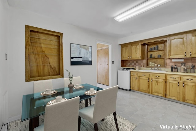505 Maple St, Golden, CO 80403 - dining space featuring light floors and washer / dryer