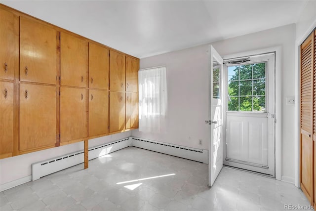 505 Maple St, Golden, CO 80403 - entryway featuring light flooring and a baseboard heating unit