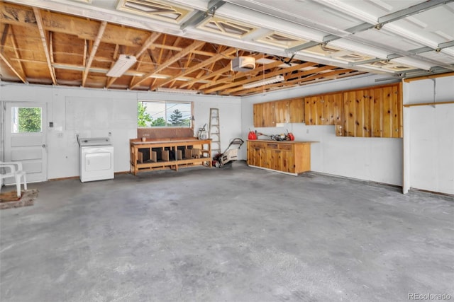 505 Maple St, Golden, CO 80403 - garage with washer / clothes dryer and a workshop area