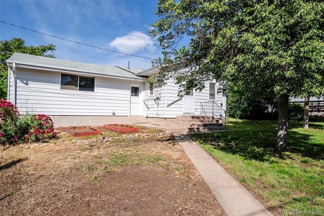 505 Maple St, Golden, CO 80403 - back of house with a lawn