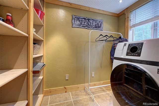 80 Meadow Ln, Bailey, CO 80421 - laundry area with washer / clothes dryer and tile patterned flooring