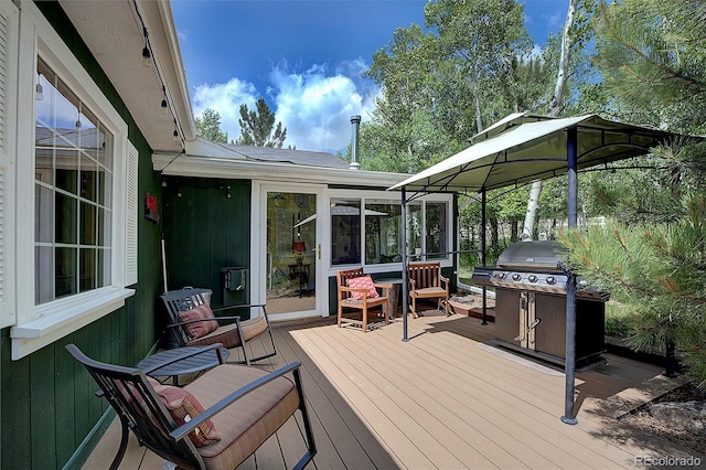 80 Meadow Ln, Bailey, CO 80421 - deck featuring a sunroom and grilling area