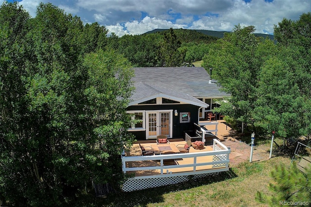 80 Meadow Ln, Bailey, CO 80421 - back of house featuring french doors, a deck, and a view of trees