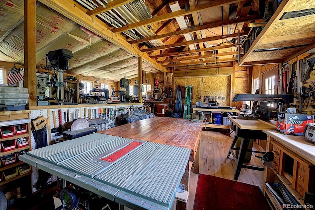 80 Meadow Ln, Bailey, CO 80421 - dining area with a workshop area, wood-type flooring, lofted ceiling, and healthy amount of natural light