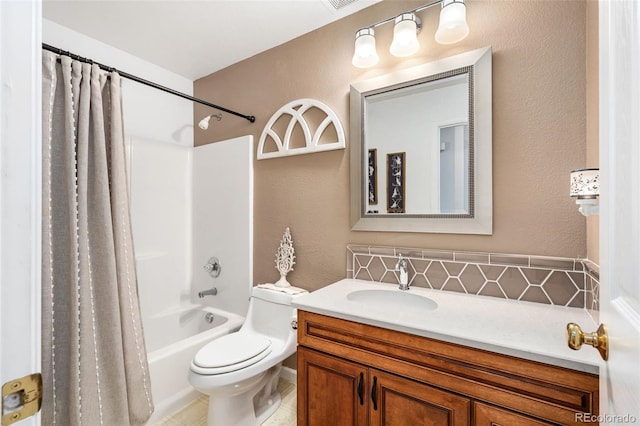 full bathroom featuring tasteful backsplash, toilet, vanity, and shower / bath combo with shower curtain