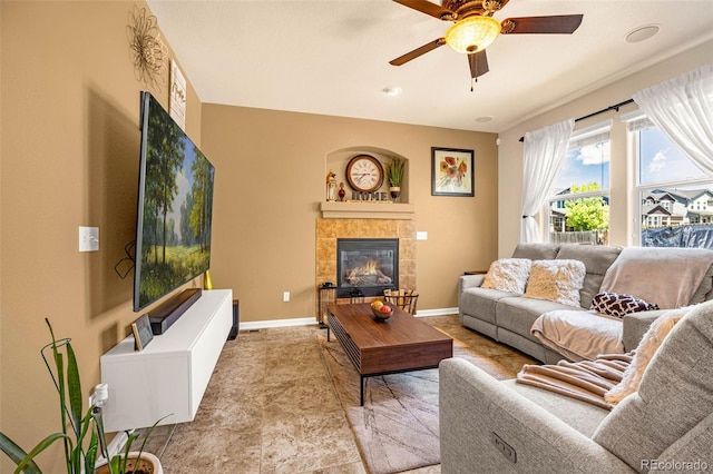 8004 Brittinger Way, Colorado Springs, CO 80951 - living area featuring a ceiling fan and a fireplace