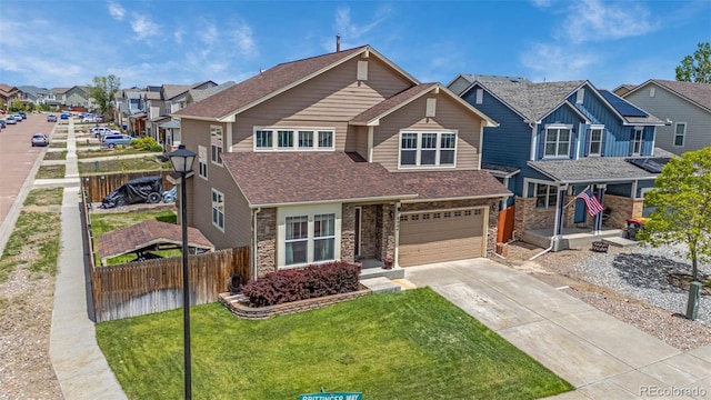 8004 Brittinger Way, Colorado Springs, CO 80951 - view of front of property with stone siding, an attached garage, a residential view, driveway, and roof with shingles
