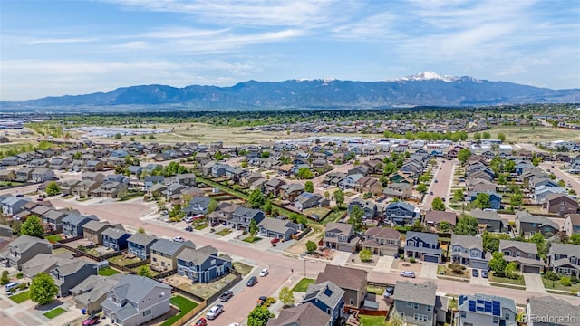 8004 Brittinger Way, Colorado Springs, CO 80951 - aerial view of residential area featuring a mountain backdrop