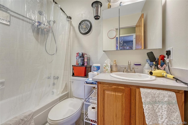 full bathroom with toilet, shower / tub combo with curtain, and vanity