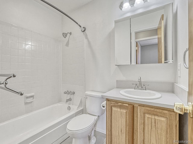full bathroom featuring toilet, vanity, and  shower combination