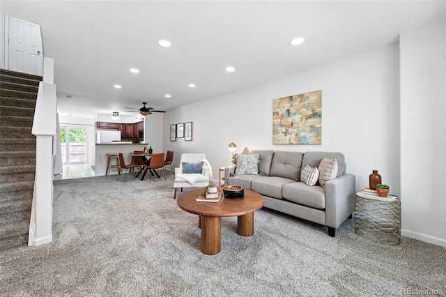 3300 W Florida Ave Unit 117, Denver, CO 80219 - carpeted living room featuring stairs, recessed lighting, ceiling fan, and baseboards
